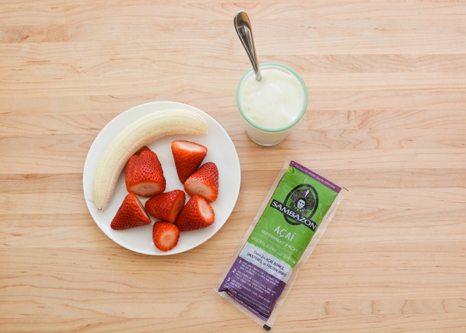 Strawberries and acai makes a smoothie kids will love.