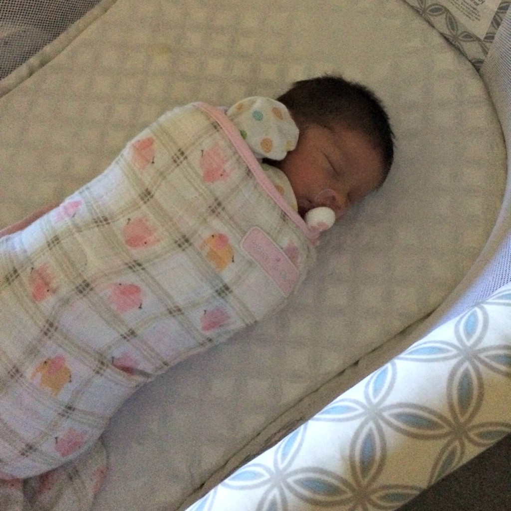 baby sleeping in halo bassinest